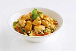 Chicken ragout on vegetable rice