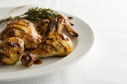 Grilled chicken pieces with rosemary