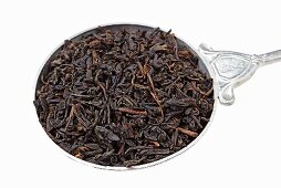 Lapsang souchong tea from China (tea leaves on spoon)