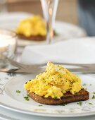 Scrambled egg with crabmeat on toast