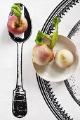 Fresh turnips on printed tablecloth