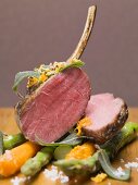 Lamb chops with carrots, asparagus and sage