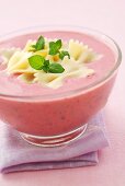 Cold strawberry yoghurt soup with farfalle and mint