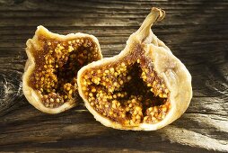 Dried figs on wooden board