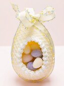 Filled sugar egg with bow for Easter