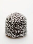 Chocolate teacake covered in grated coconut