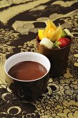 Chocolate fondue with mixed fruit