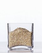 Pearl barley in a square glass