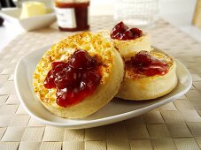 Crumpets with strawberry jam