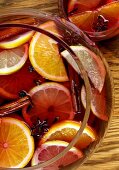 Mulled wine in punch bowl and glass cup