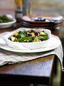 Spinach with apples and pine nuts (Spain)