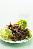 Romaine lettuce with beef and chilli