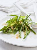 Rocket and bean salad with almonds and lemon zest