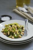 Leeks and cannellini beans with mustard sauce on plate