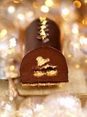 Chocolate truffle roulade with gold leaf (Christmas)