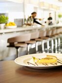 A lemon tart in a restaurant