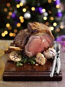 Sliced roast beef with garlic for Christmas dinner