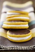 Banana moon pies with a marshmallow filling and chocolate icing