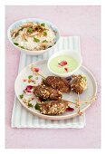 Meat kebabs with green curry sauce and coconut basmati rice
