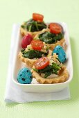 Spinach, walnut and tomato tartlets