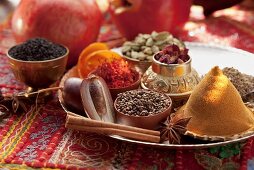 An arrangement of spices with pomegranates (Arabia)