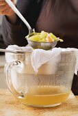 Vegetable stock being sieved