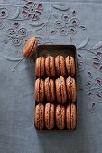 Chocolate macaroons in an old tin
