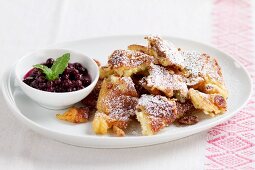 Kaiserschmarrn (shredded sugared pancake from Austria) with lingonberry jam