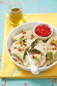 Swabian raviolis with spinach-bean filling and chili olive oil