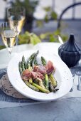 Roasted green asparagus with parma ham and parmesan