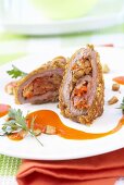 Spring chicken breast filled with pears and vegetables and served with carrot juice