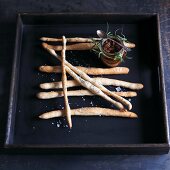 Grissini al papavero (bread sticks with poppy seeds and salt)
