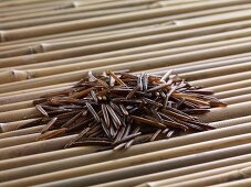 Wild rice on bamboo sticks