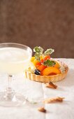 Fruit tartlets and champagne