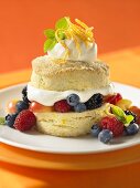 Shortcake with mixed fruit, cream and candied orange zest