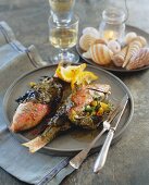 Grilled red mullet in vine leaves