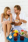 Young couple having breakfast