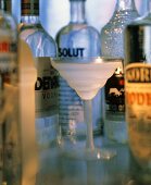 Chilled Vodka in Stem Glass; Bottles