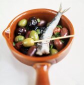 Olive marinate (Marinated olives with sardine, Italy)