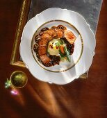 Dinner Plate of Sliced Steak with Mashed Potatoes and Green Pepper Sauce