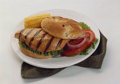 Grilled Chicken Breast Sandwich with Corn on the Cob