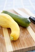 Organic Yellow Squash and Zucchini on a Cutting Board, Knife