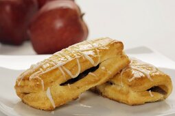 Two Apple Danishes on a Plate, Fresh Apples