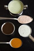 Bowls and Spoonfuls of Assorted Homemade Dressings, From Above
