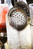 Bar Strainer in Glass with Ice