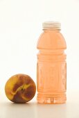 Peach with Bottle of Flavored Vitamin Water
