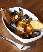 Seafood Dish of Mussels, Shrimp and White Fish in Broth with Bread
