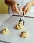 Placing Chocolate Chip Cookie Dough onto a Baking Sheet