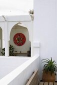 View of a colorful wall lamp in an oriental arcade