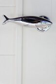 Chrome door handle in the shape of a fish